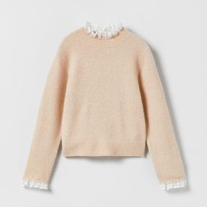 Zara cream knit sweater with lace trim.